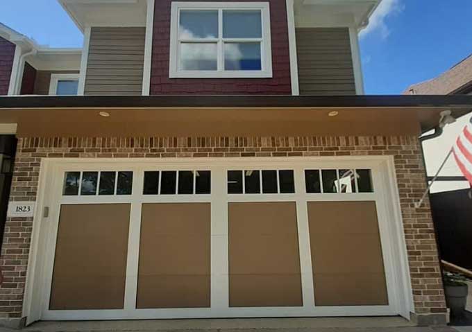 Carriage-style garage door installed by 3A Garage Doors