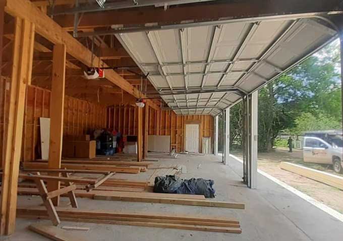 New garage door installation in a home under construction